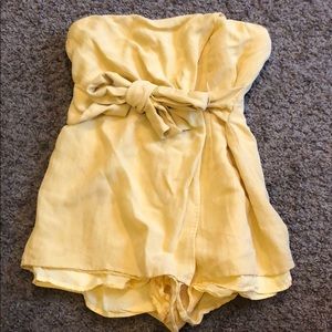 Small yellow romper with bow